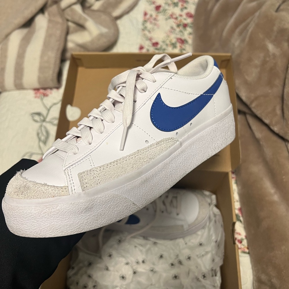 Nike White Sneakers with Blue Swoosh